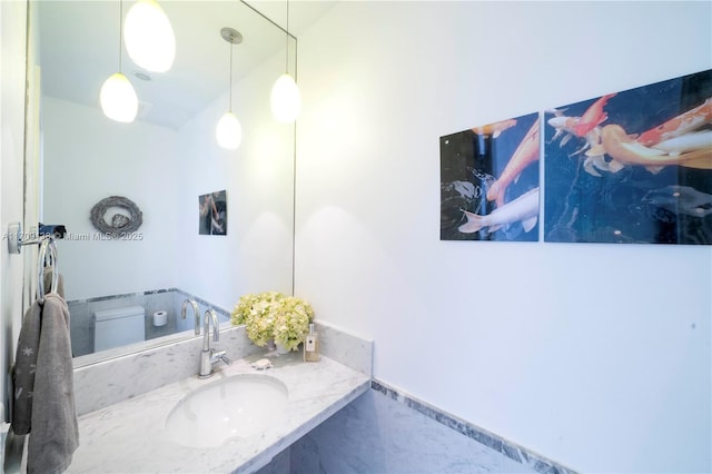 6103 Aqua Ave Unit 301, Miami Beach, FL 33141 - bathroom with toilet and vanity