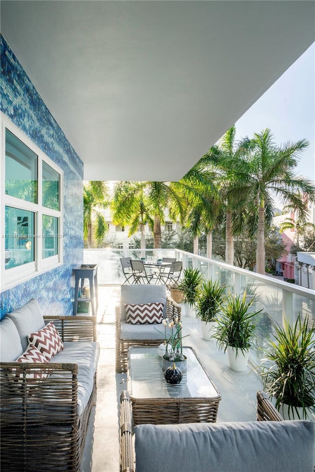 view of patio / terrace featuring an outdoor living space and a balcony