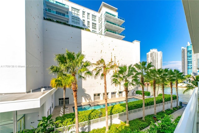 view of property with a water view