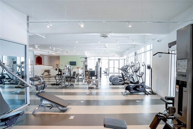 exercise room with rail lighting