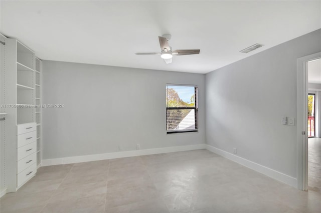 spare room featuring ceiling fan