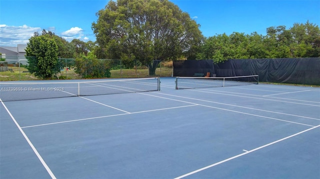 view of tennis court with basketball court