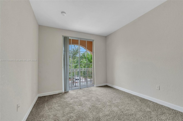 unfurnished room with carpet floors