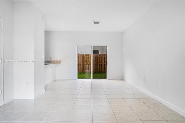 view of tiled spare room