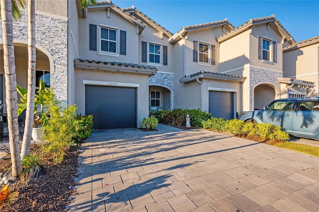 view of front of property with a garage