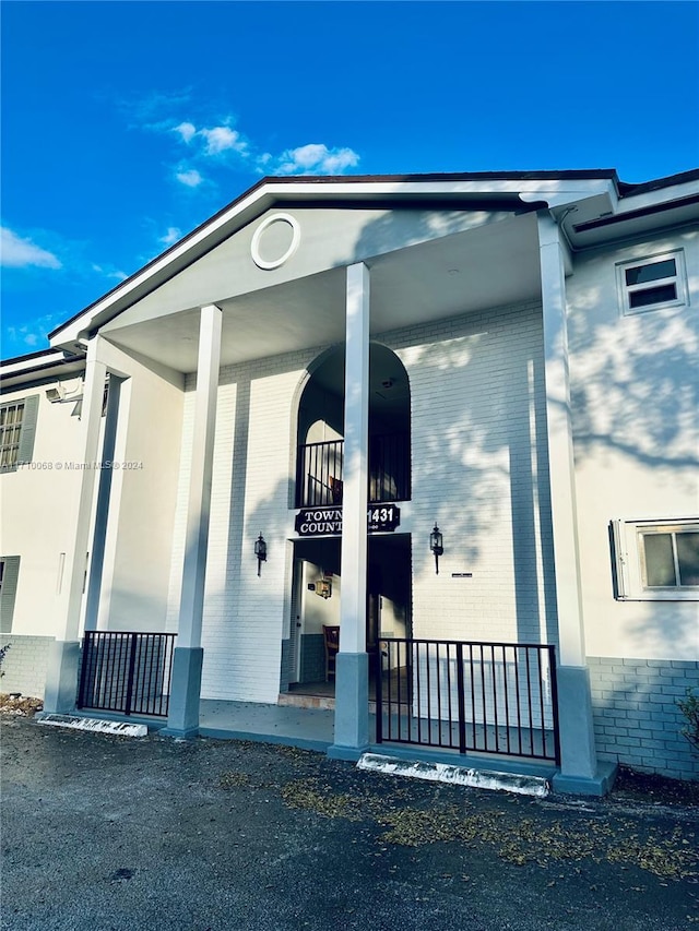 view of home's exterior featuring a porch