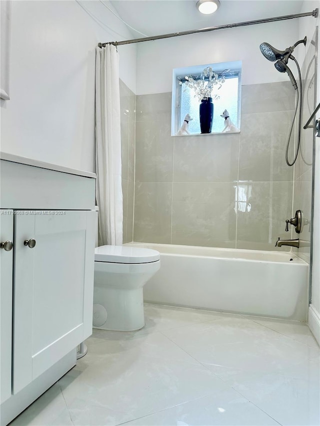 bathroom featuring tile patterned flooring, shower / bathtub combination with curtain, and toilet