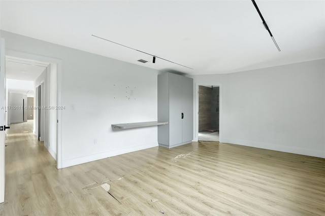 empty room featuring light hardwood / wood-style floors