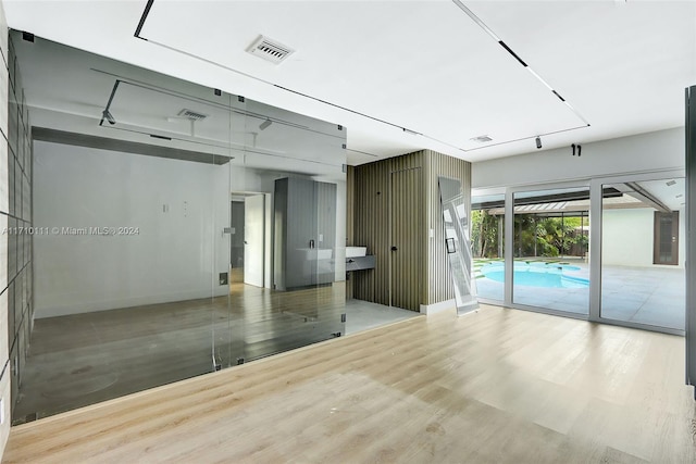 spare room with light wood-type flooring