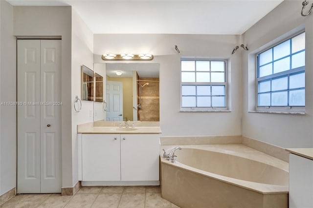 bathroom featuring vanity, tile patterned floors, and independent shower and bath