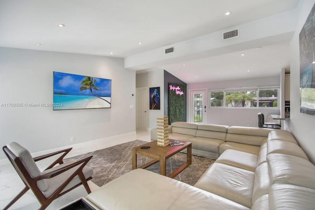 living room with vaulted ceiling