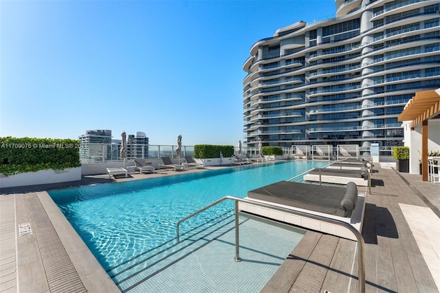 view of swimming pool with a patio area