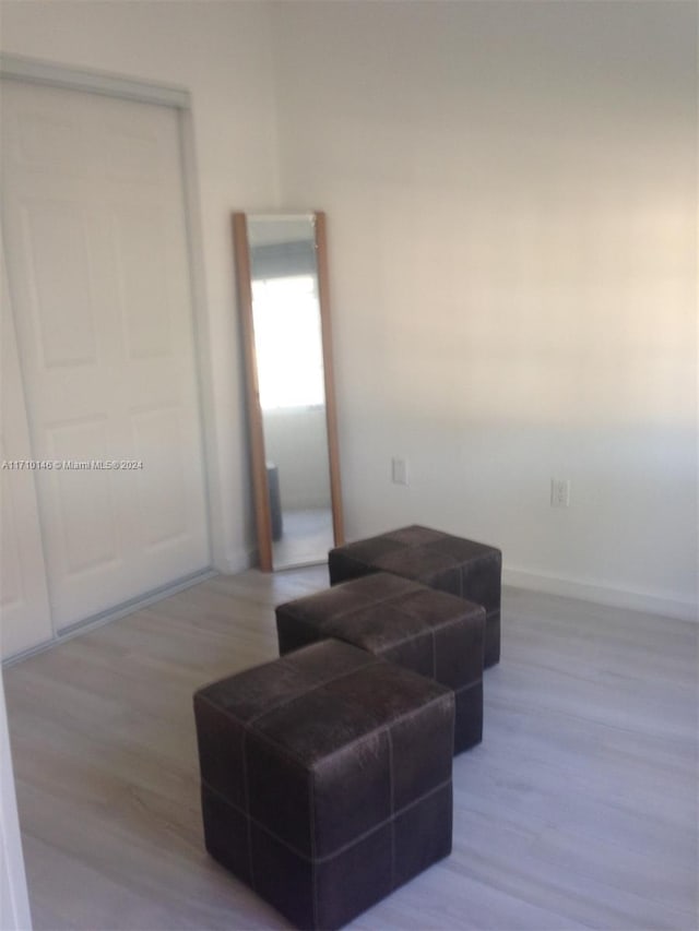 living area featuring hardwood / wood-style flooring