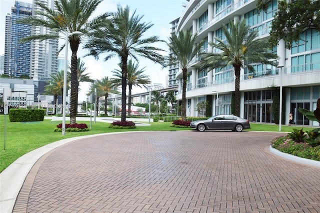 view of home's community with a lawn