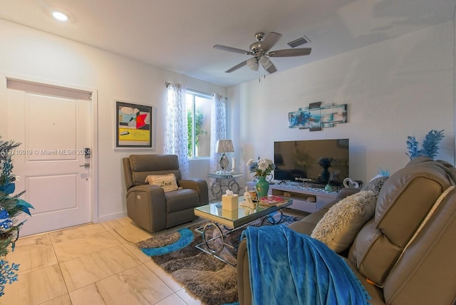 living room featuring ceiling fan