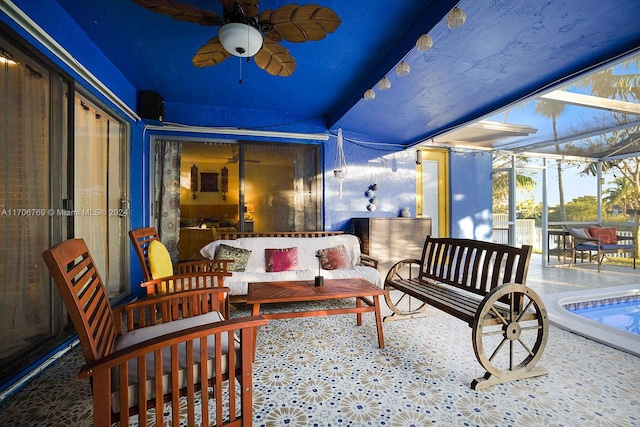 view of patio featuring an outdoor living space and glass enclosure