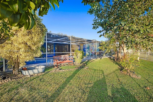 view of yard featuring a lanai