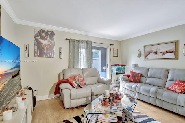 living room with crown molding and light hardwood / wood-style flooring