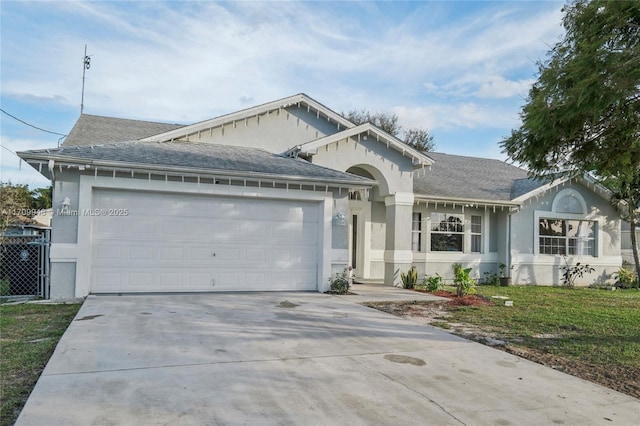 single story home featuring a garage