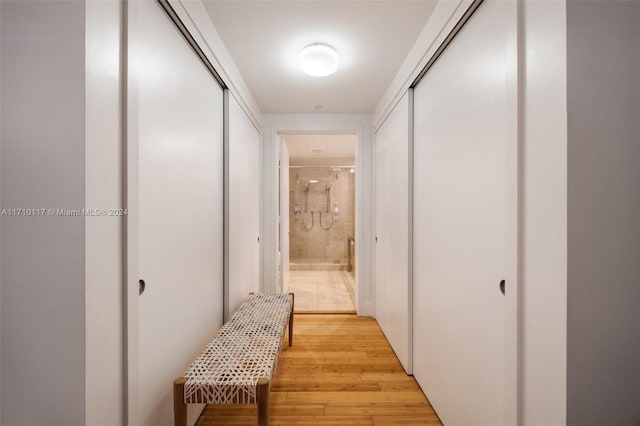 corridor featuring light hardwood / wood-style flooring