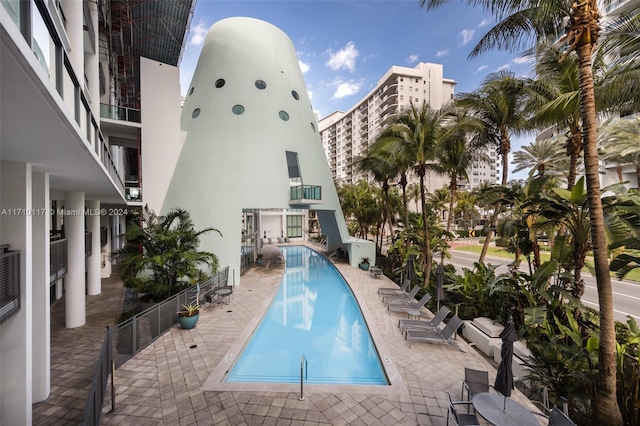 view of pool featuring a patio area