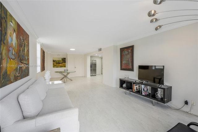 living room with ornamental molding