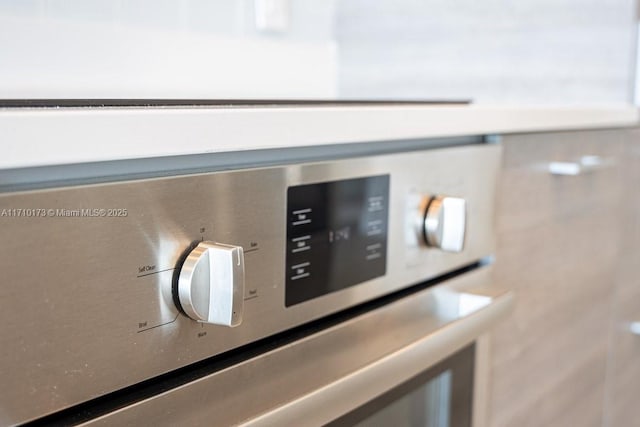 interior details with stainless steel oven