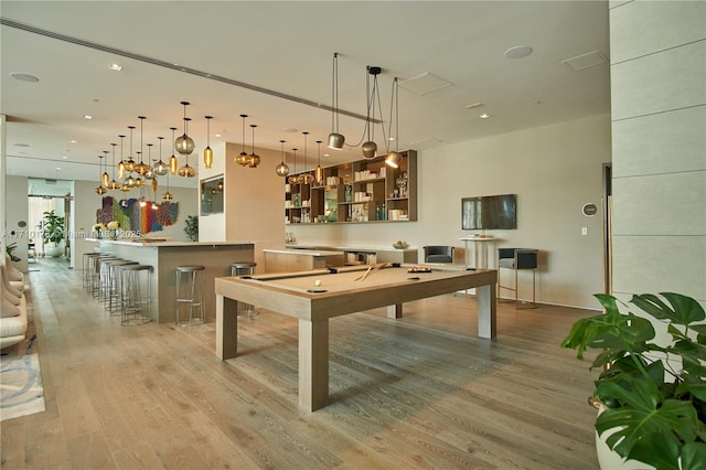 playroom featuring light hardwood / wood-style floors and billiards