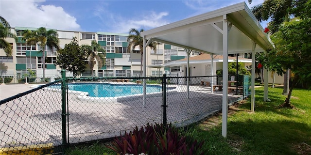 view of swimming pool with a patio