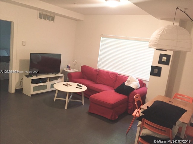 living room with vaulted ceiling