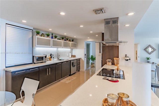 1800 NE 114th St Unit 1105, Miami, FL 33181 - kitchen with island exhaust hood, black electric cooktop, glass insert cabinets, backsplash, and recessed lighting