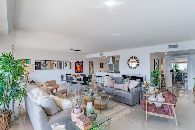 living room featuring a fireplace