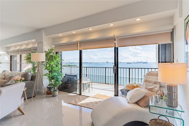 living room featuring a water view