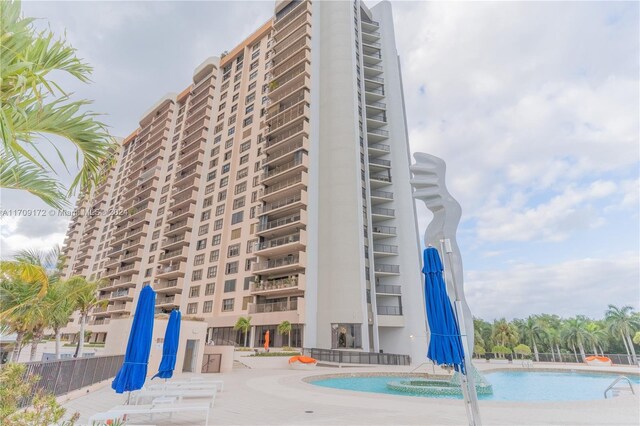 1800 NE 114th St Unit 1105, Miami, FL 33181 - view of building exterior featuring a community pool