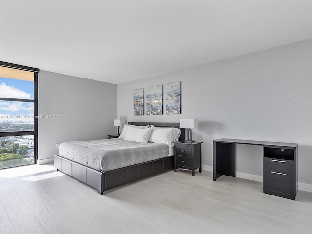 bedroom featuring light hardwood / wood-style flooring