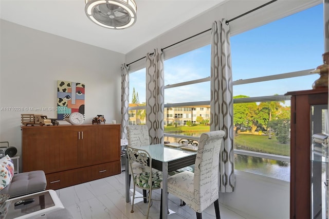 dining area with ceiling fan