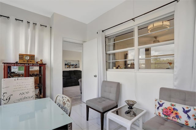 sitting room featuring light tile patterned floors