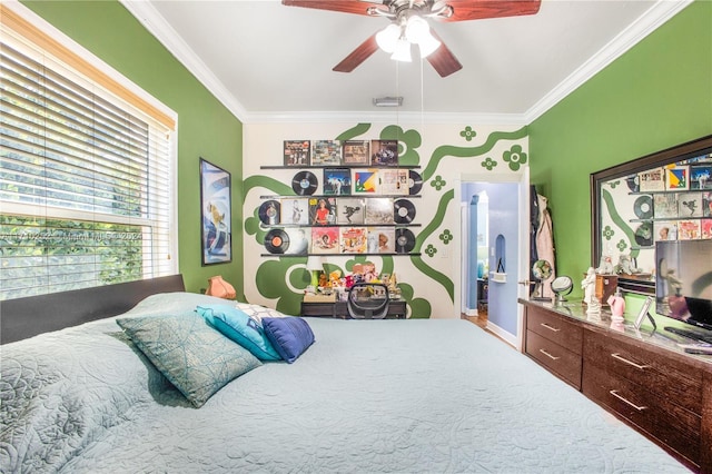 bedroom featuring ceiling fan and ornamental molding