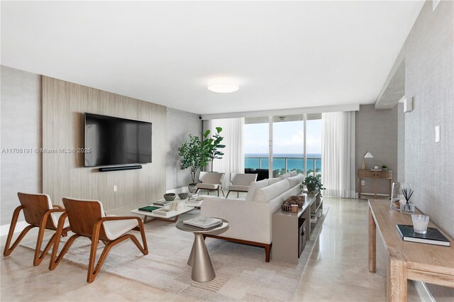 living room with floor to ceiling windows