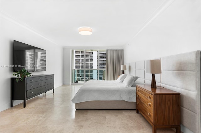 bedroom with crown molding