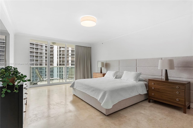 bedroom with access to exterior, floor to ceiling windows, and crown molding