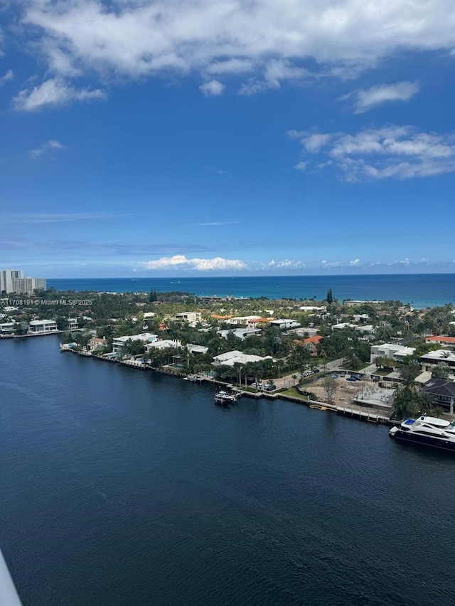 drone / aerial view with a water view