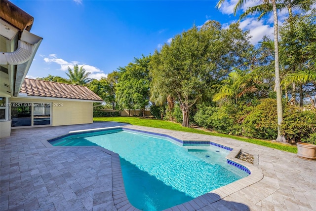 view of pool featuring a patio area