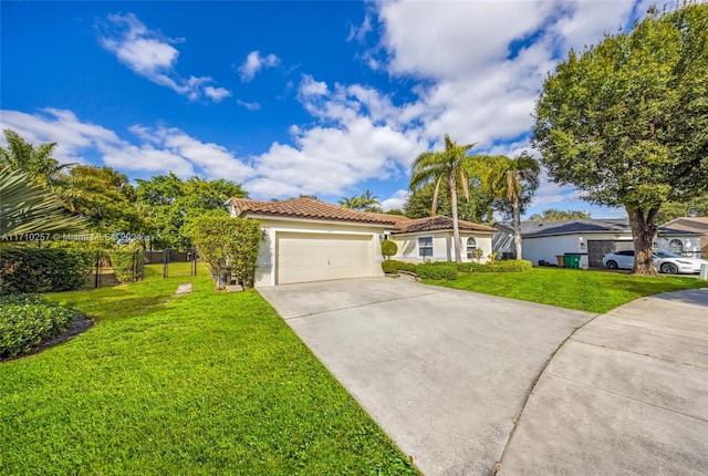 view of front of property with a front yard and a garage