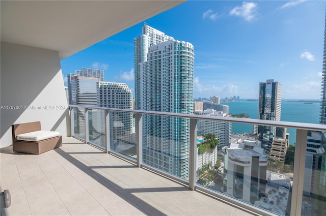 balcony featuring a water view