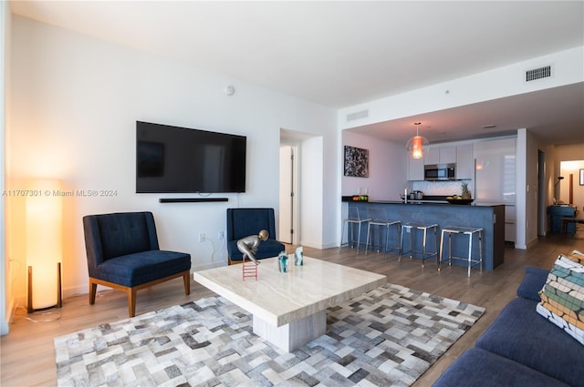 living room featuring light hardwood / wood-style flooring