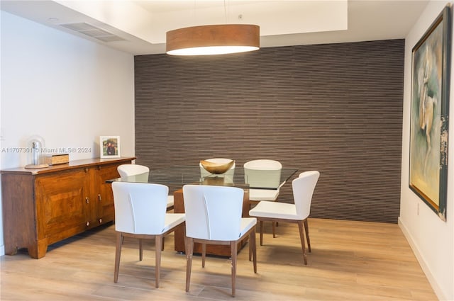 dining space featuring light hardwood / wood-style floors