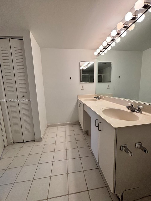 bathroom featuring vanity and tile patterned flooring