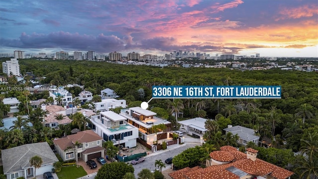 aerial view at dusk with a view of city