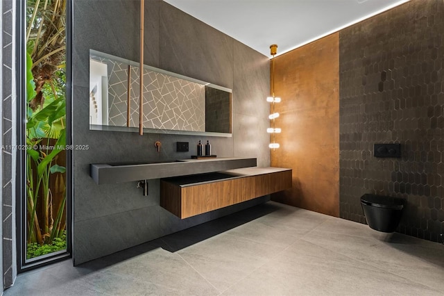 bathroom with tile patterned flooring, toilet, and vanity